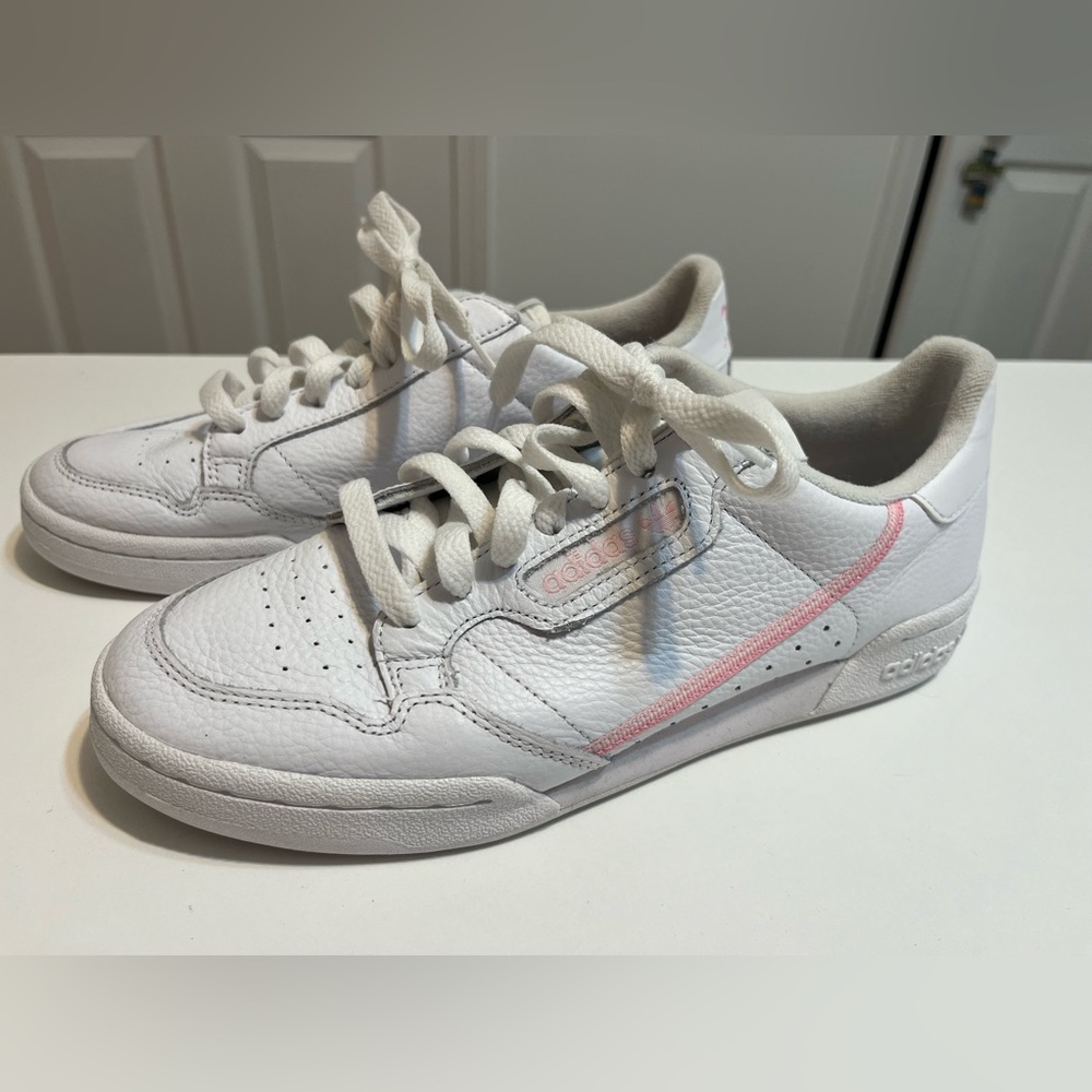 Pink and white retro Adidas sneakers